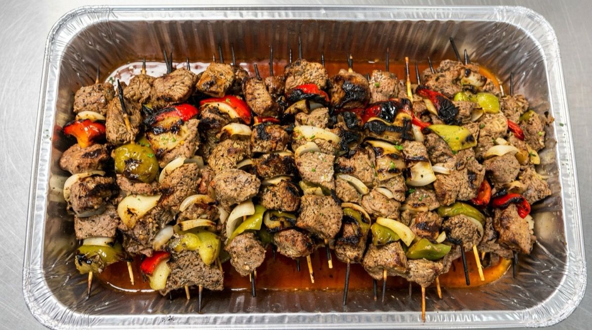 Kebob skewers on the grill at Phoenician Garden Mediterranean in Fresno