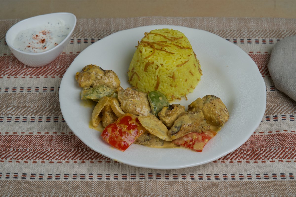 Phoenician Garden Spicy Chicken - fire-grilled diced chicken with our signature spice blend