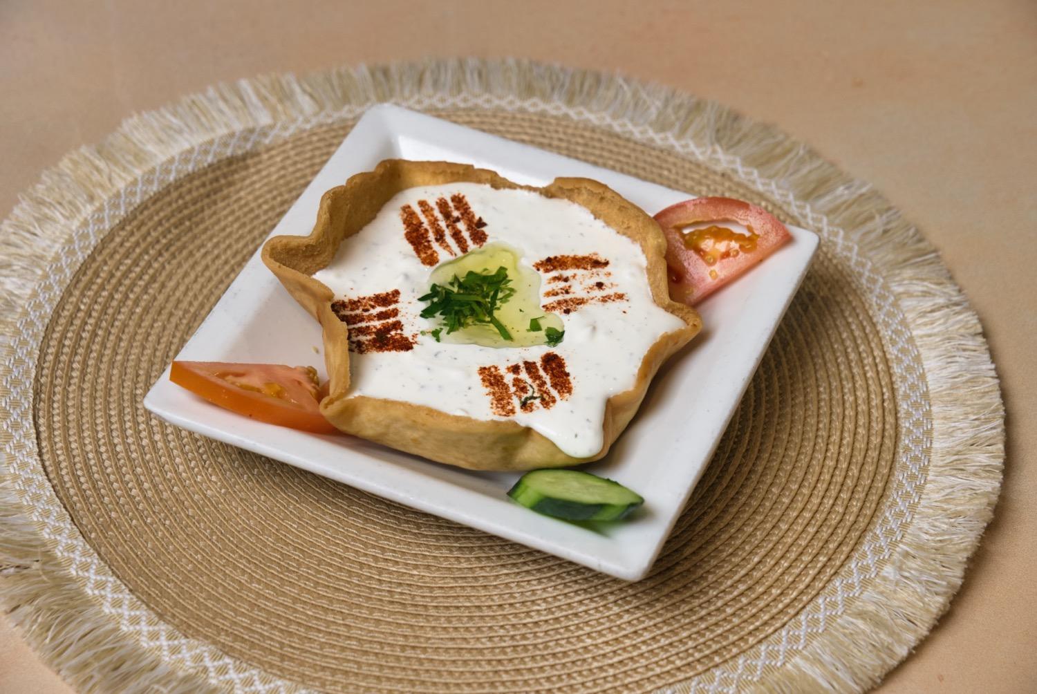 Labneh yogurt cream with garlic and mint at Phoenician Garden Fresno