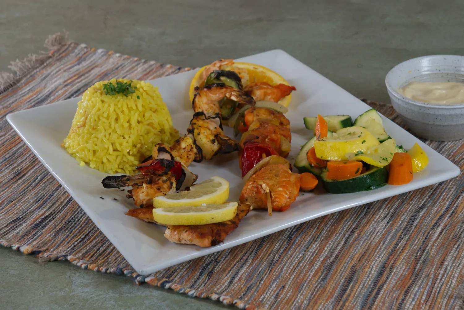 Seafood Combo Kebobs with fish, shrimp, and salmon skewers at Phoenician Garden in Fresno