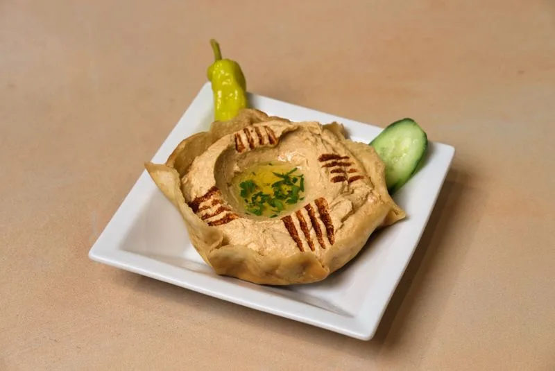Happy hour appetizers and house-made hummus at Phoenician Garden